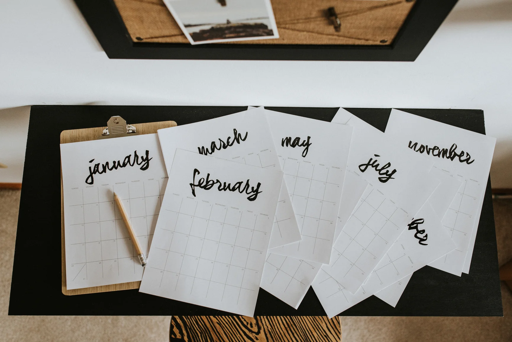 The months of the year laid out on the table for planning.