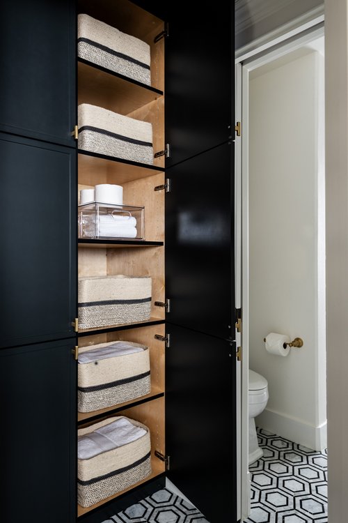 Take The Door Off Your Bathroom Linen Closet For A Chic And Open Feeling