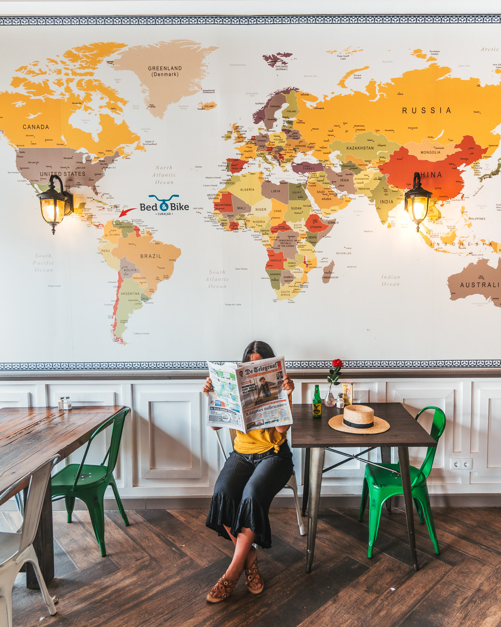 A cute cafe with a map on the wall in Willemstad, Curaçao // 20 Photos to Show You Why Curaçao Needs to Be On Your Travel Radar // www.readysetjetset.net #readysetjetset #curacao #caribbean #beach #ocean #paradise #travel