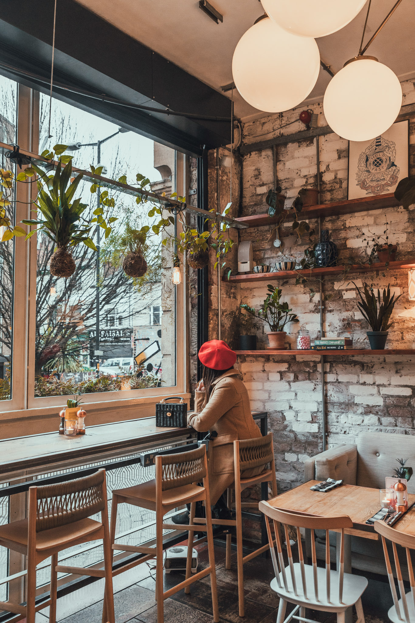 The succulent-filled interior of Evelyn's Cafe Bar in Manchester // 11 INSTAGRAM-WORTHY PHOTO SPOTS IN MANCHESTER, ENGLAND // www.readysetjetset.net #readysetjetset #manchester #england #uk #unitedkingdom #cityguide #travel
