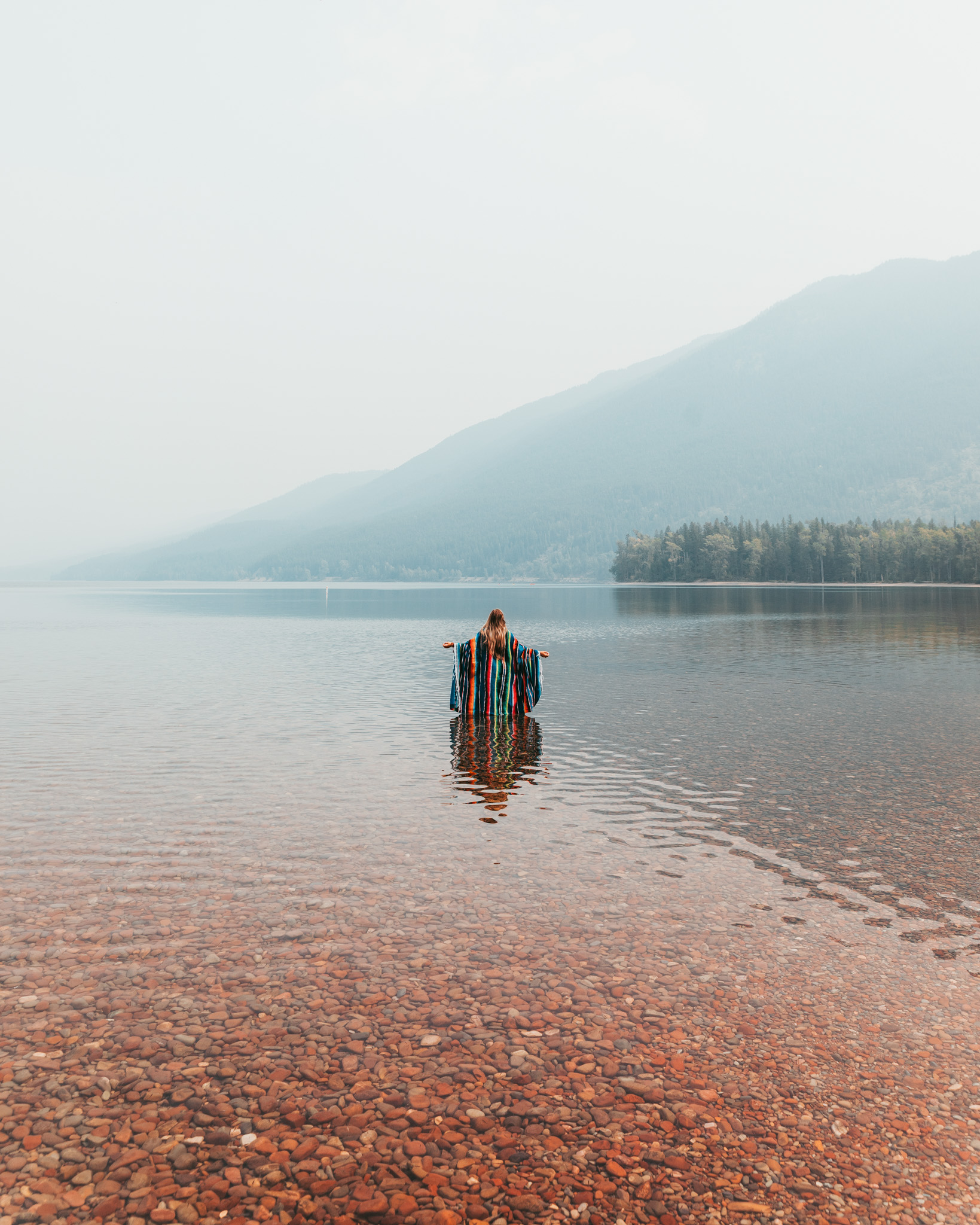 Lake McDonald obscured by smoke of Howe Ridge Fire in August 2018