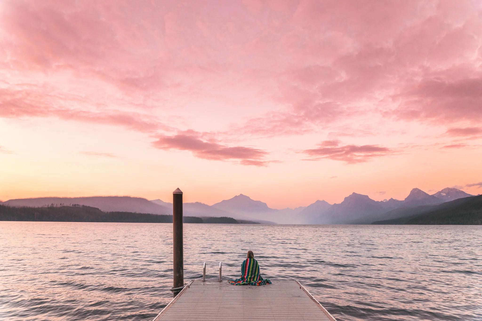 Pink sunset at Lake McDonald in Glacier National Park Montana