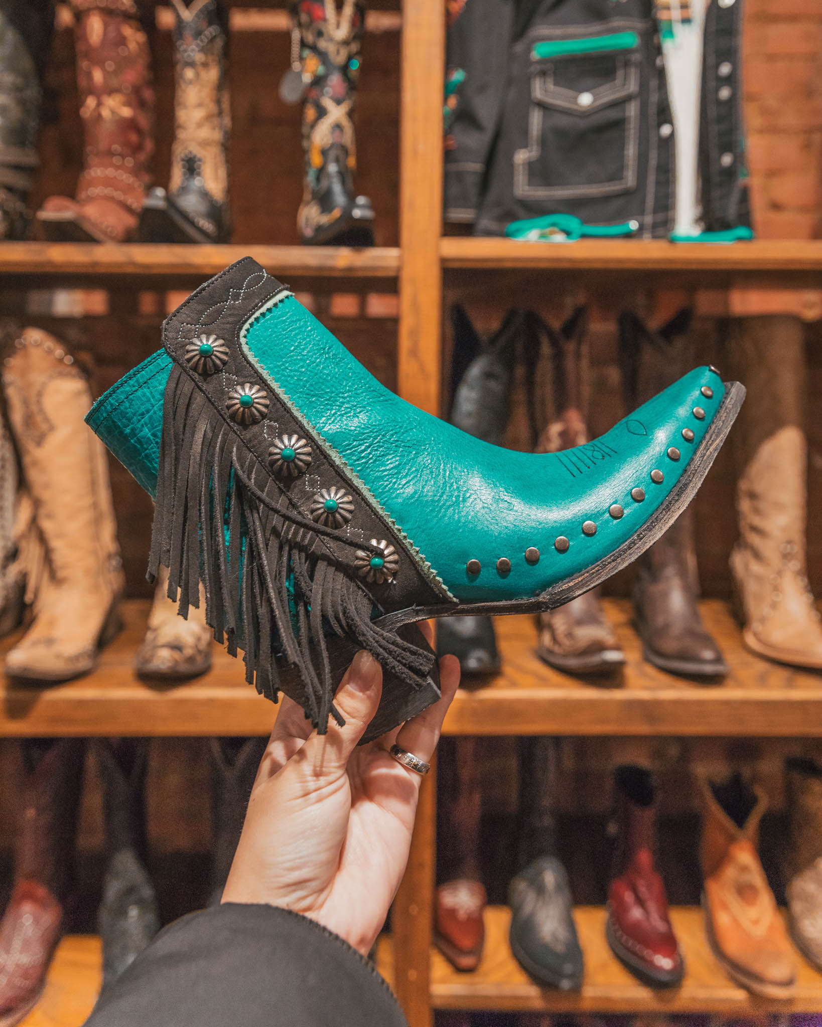 Cowboy boot shopping in the Fort Worth Stockyard for teal boots