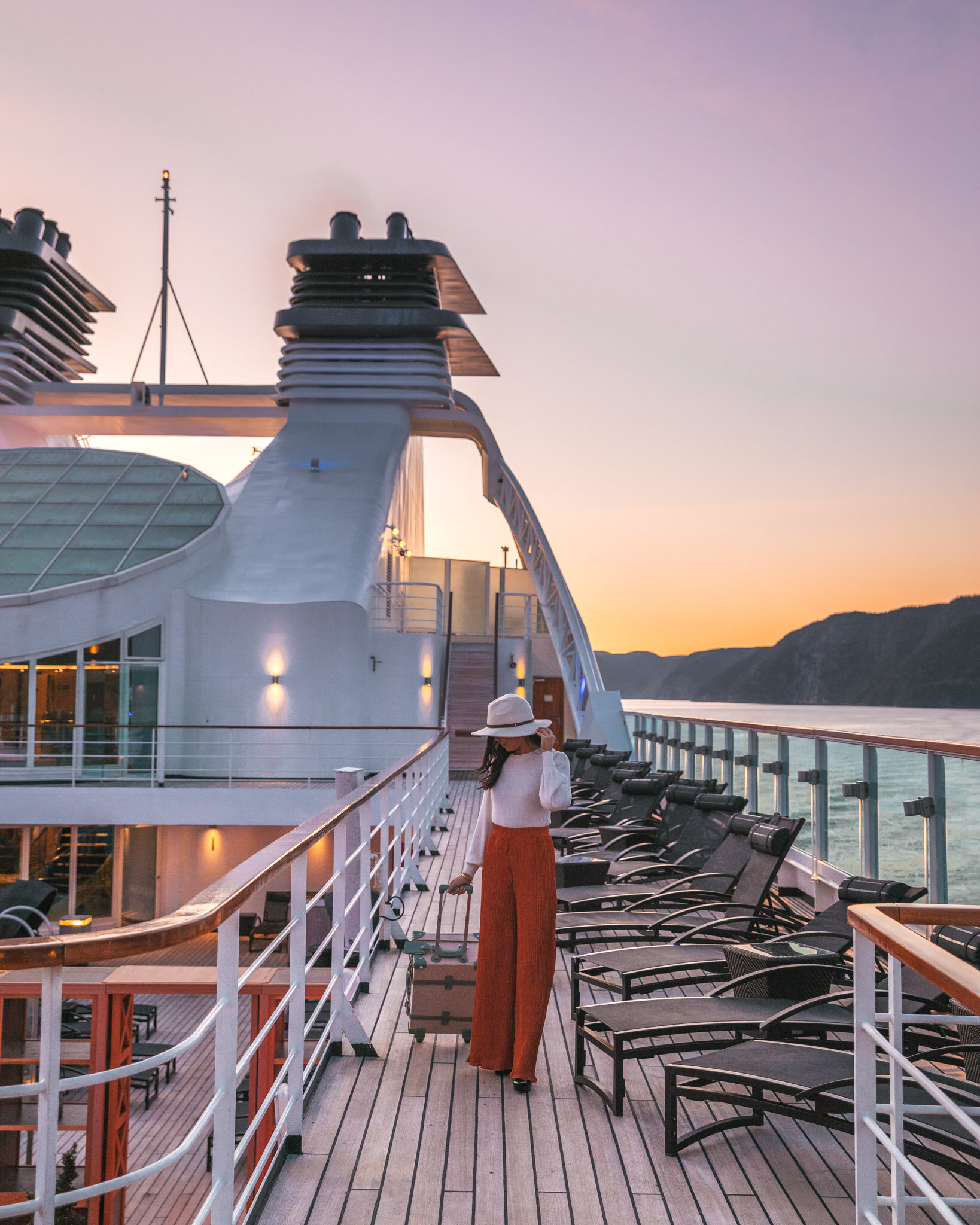 Seabourn Quest at sunset on the Saguenay Fjord in Canada // Cruise Review: 11-Day New England & Canada on the Seabourn Quest // #readysetjetset #canada #cruise #luxury #travel #cruising