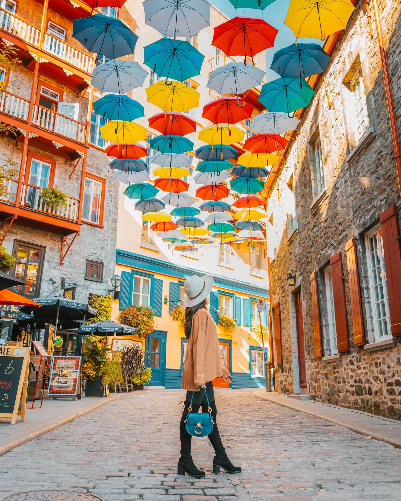 Quebec City umbrella street in Old Town // Cruise Review: 11-Day New England & Canada on the Seabourn Quest // #readysetjetset #cruise #luxury #travel #cruising #canada