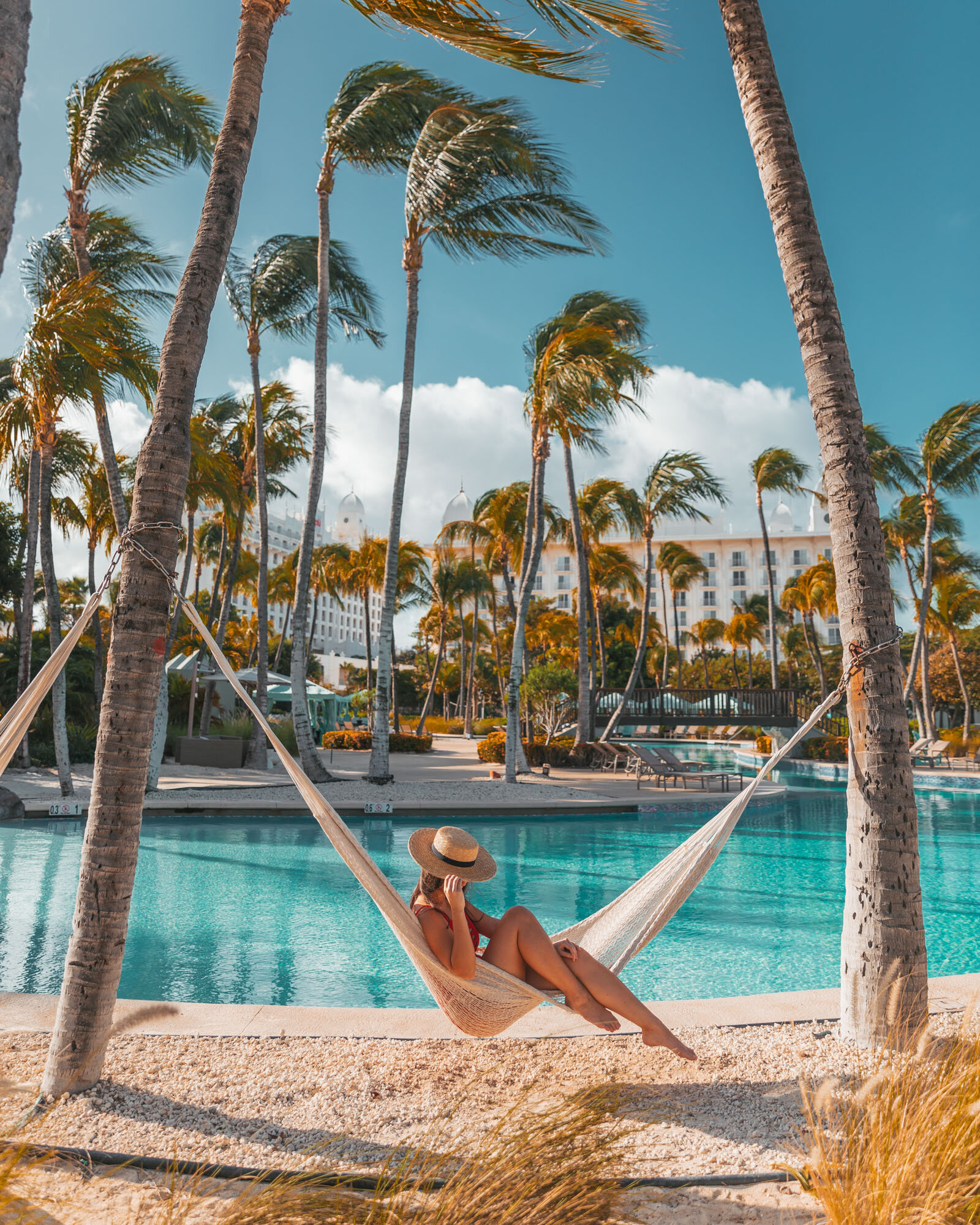 Pool hammock at the Hilton Aruba Caribbean Resort & Casino | Ready Set Jet Set | Beach Destinations | ABC Islands | Aruba Hotels | Luxury Hotels | Honeymoon Travel | Caribbean Beach Resorts