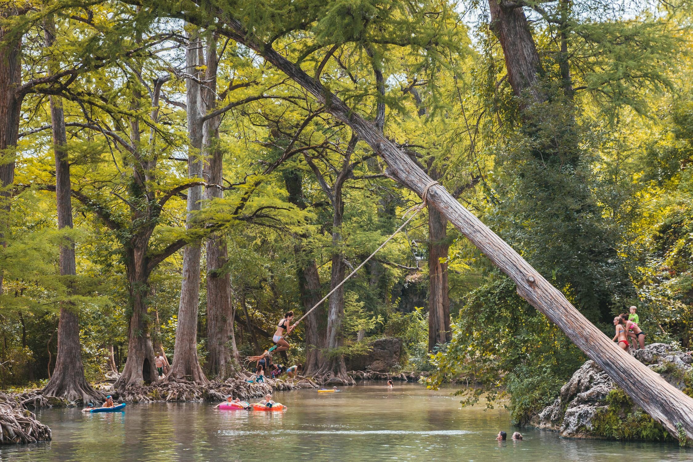 Krause Springs: One of the Best Swimming Holes in Texas // Krause Springs is a natural swimming hole just outside of Austin in Spicewood, Texas. It's beautiful waterfall and cool temperatures make it one of the best swimming spots in the Texas Hill …