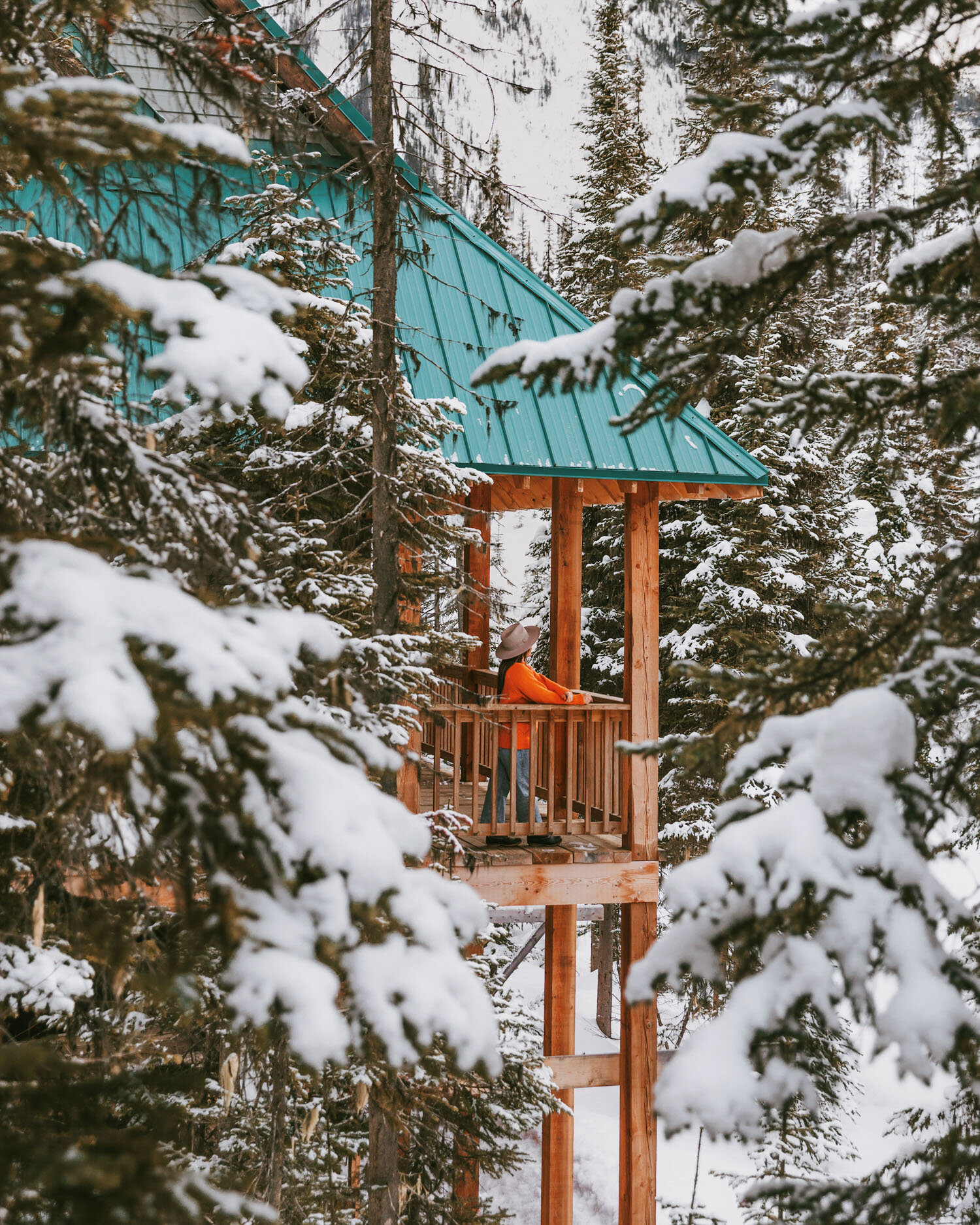 Emerald Lake Lodge snowy winter cabin // The Ultimate Guide to Visiting Banff in Winter