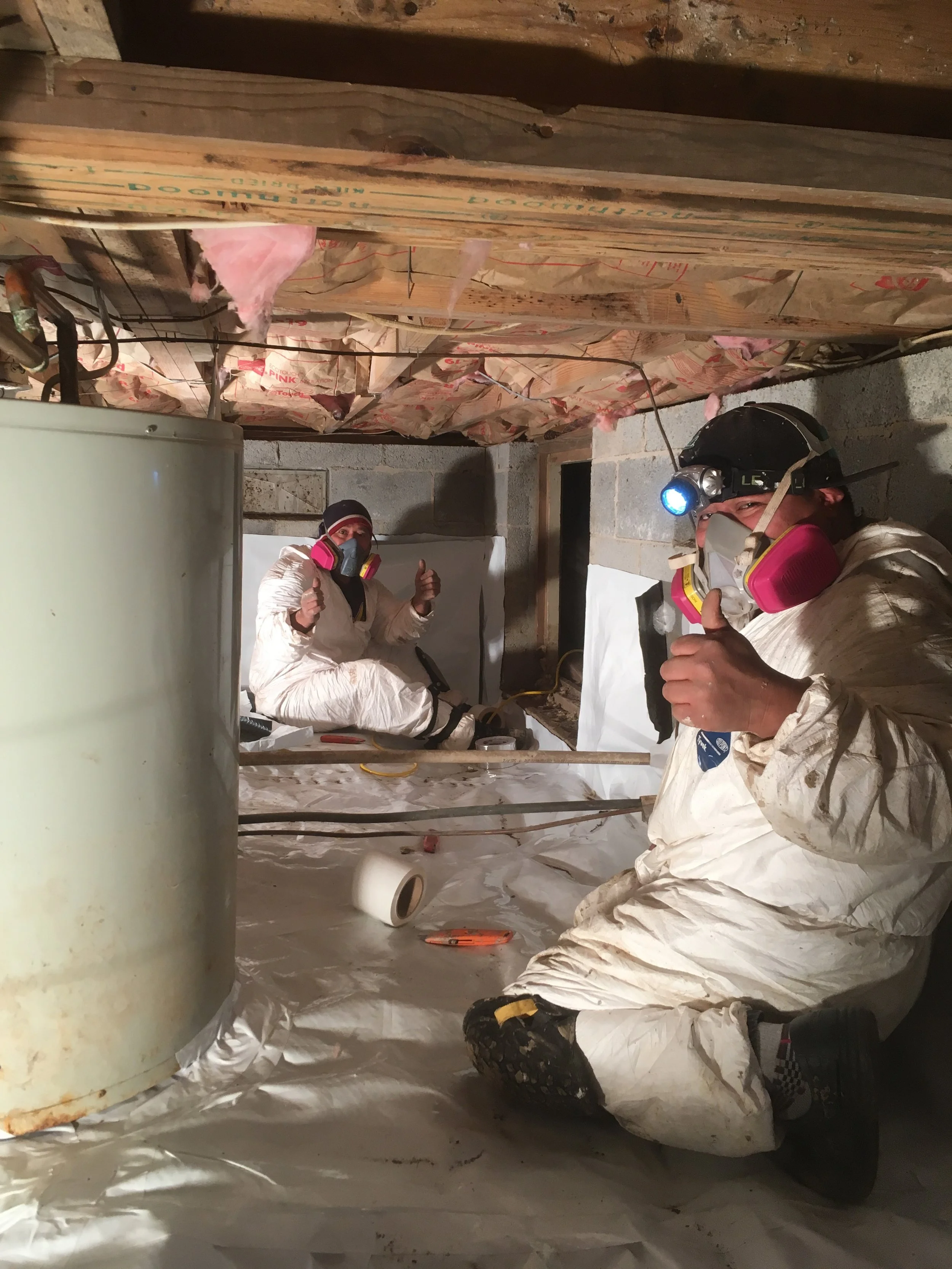 The Team working on a sealed vapor barrier in Cary, NC