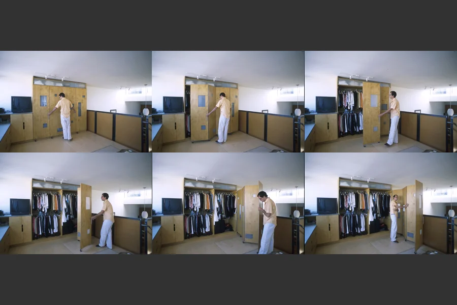 The operation of the privacy screen as seen from the bed.