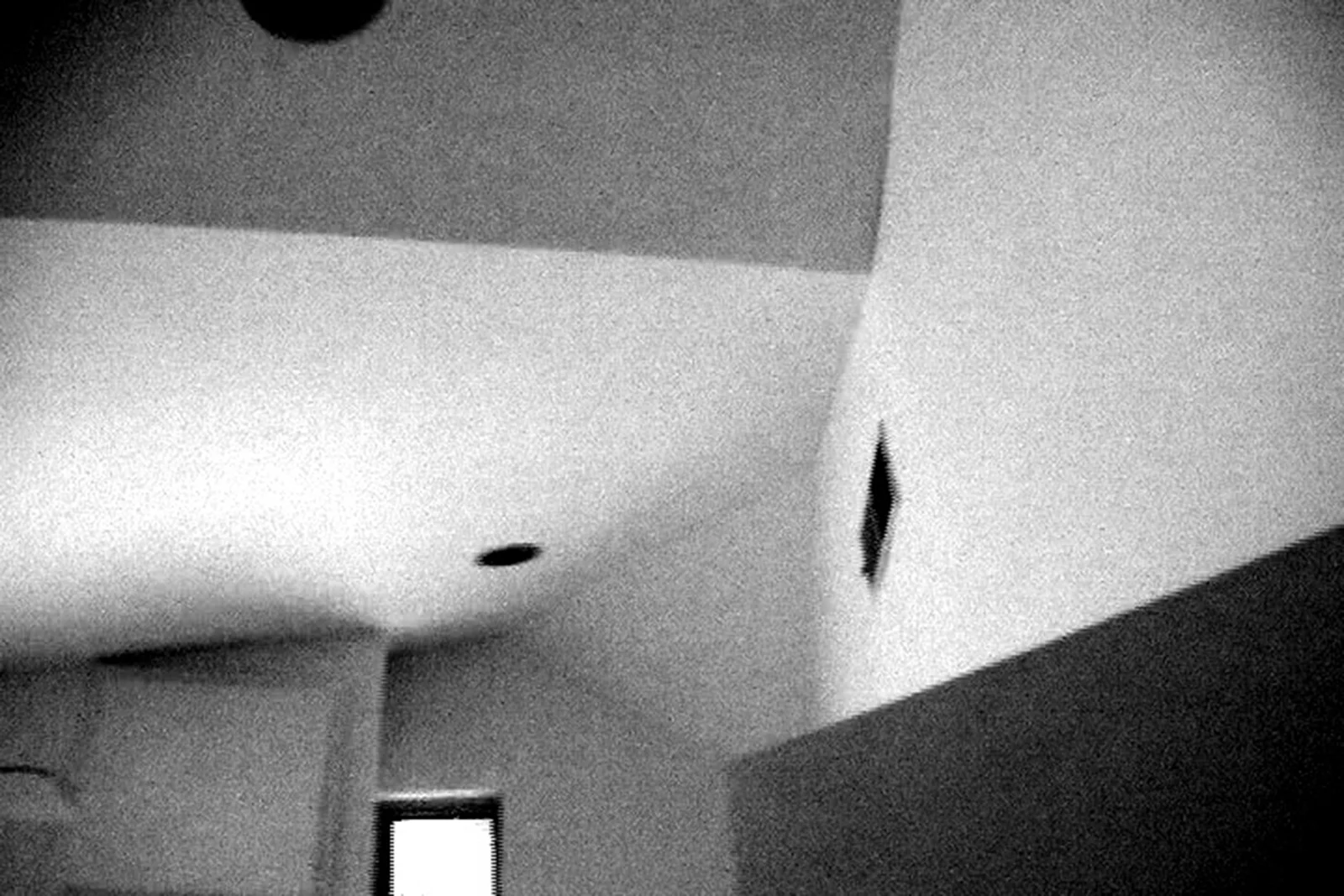 From inside the upper bedroom, as view of the ceiling as it results from the roof profile.
