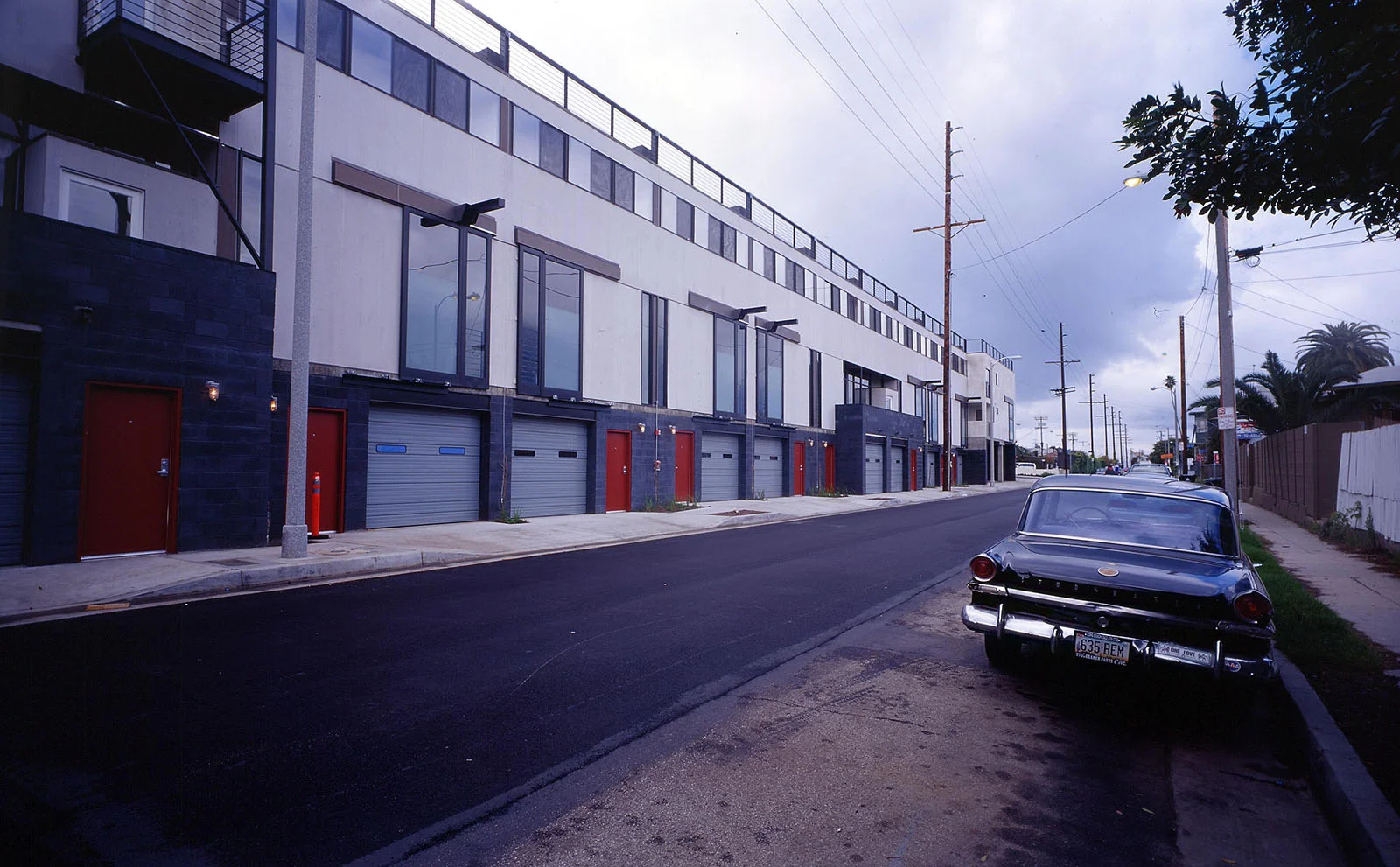 This is a 16 unit live-work condominium development in Venice, CA. This view is looking North on Electric Avenue.