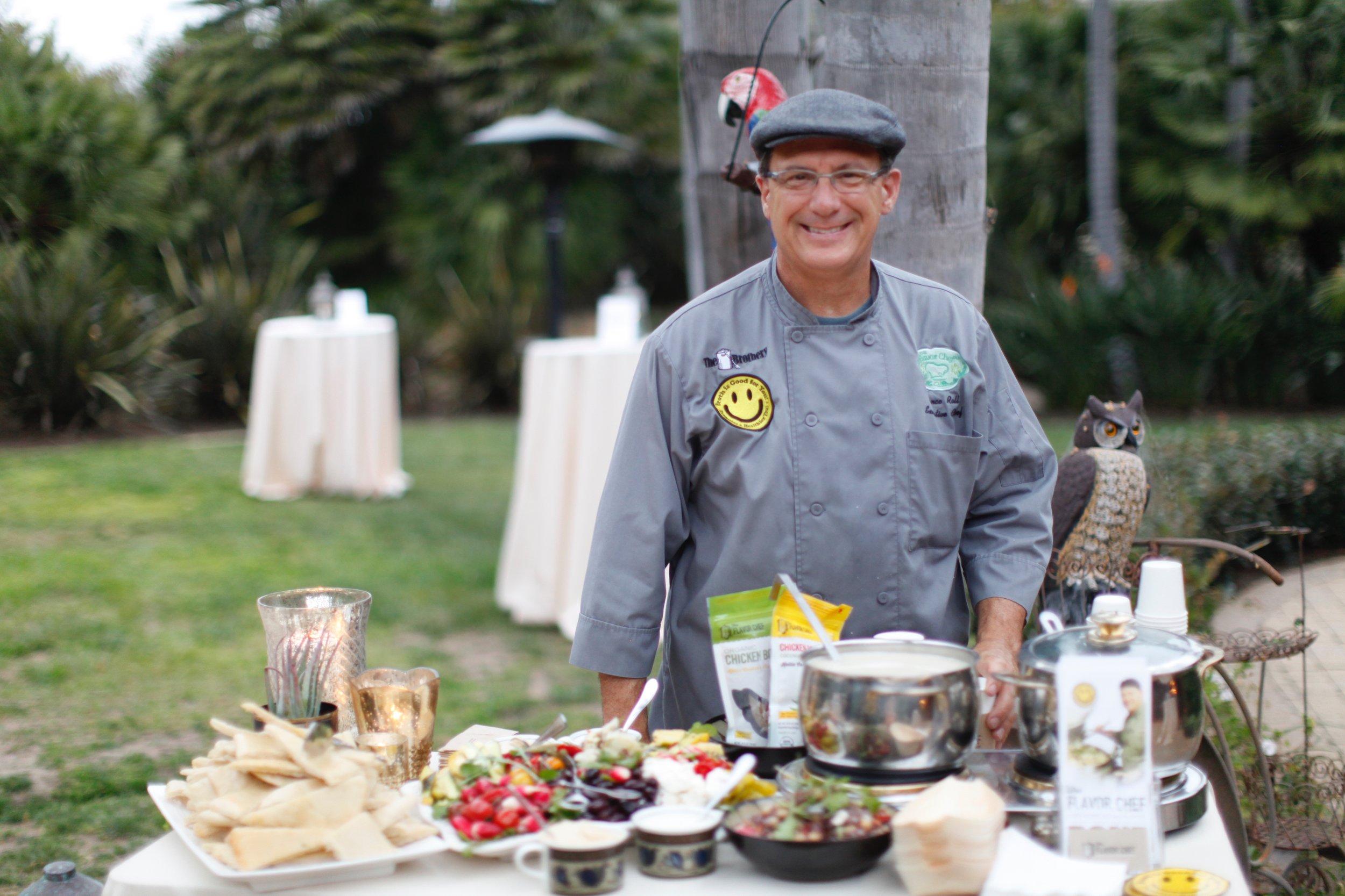 Flavor Chef serving guest his signature organic product “Genuine Chicken Bone Broth”.