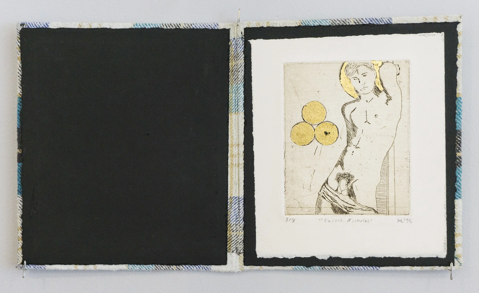 Saint Nicholas Etching on paper bound in plaid fabric
