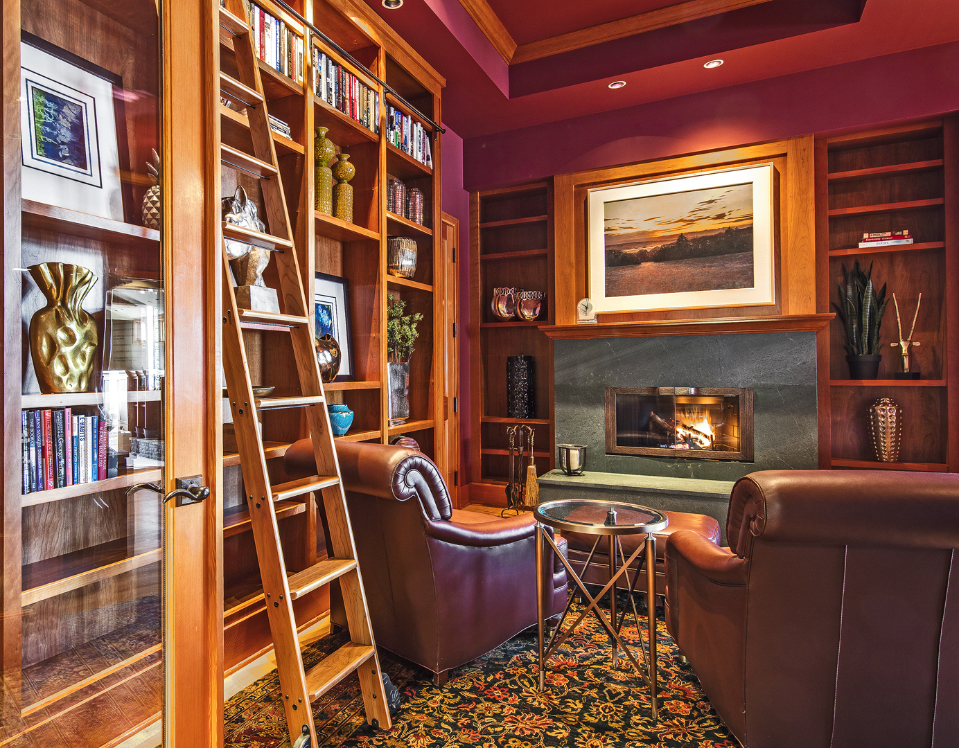 Photo of cozy fireplace and in home library study designed by a Seattle Residential Architect