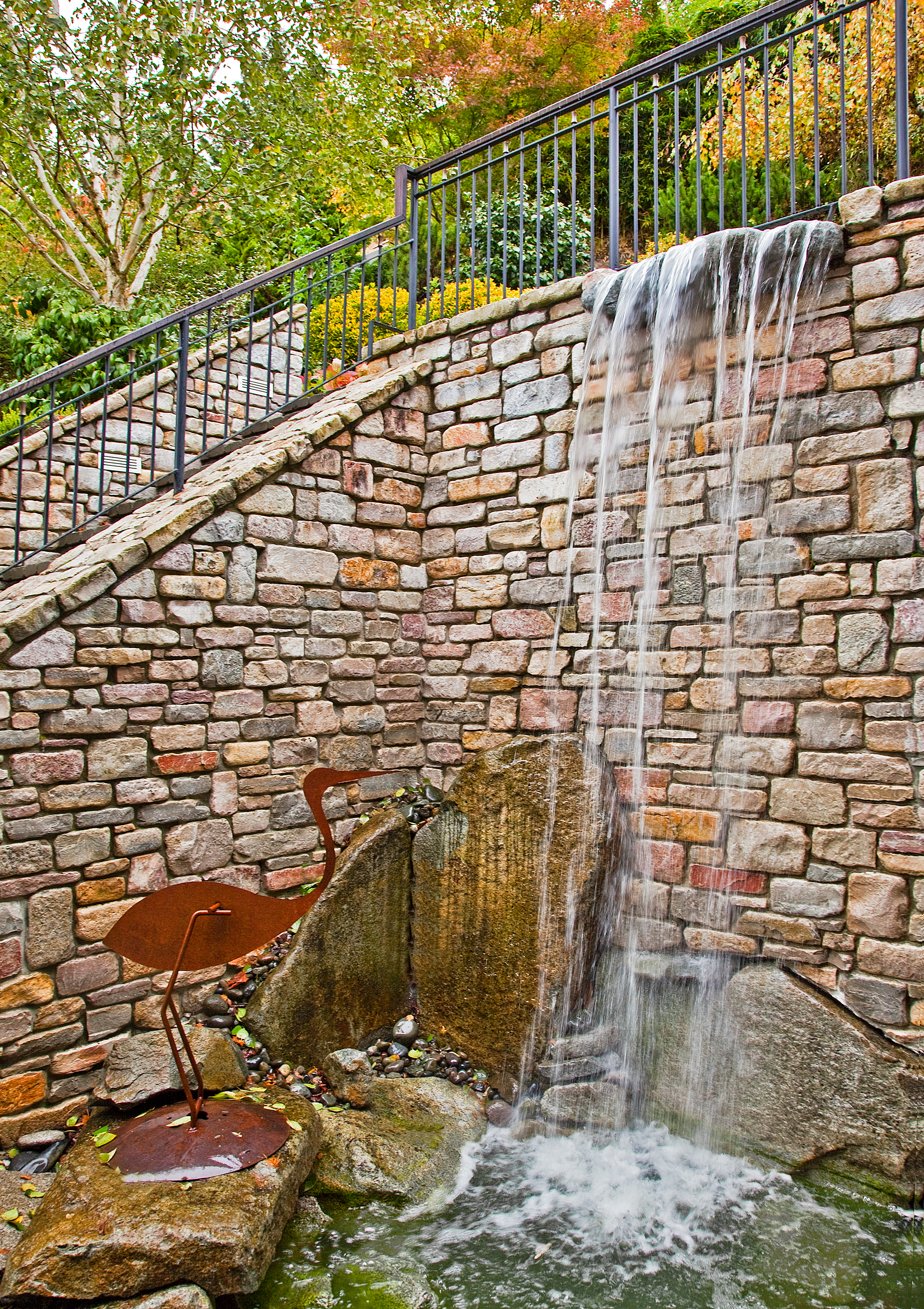 Waterfall built into residential design by Seattle architecture firm TCA Architecture
