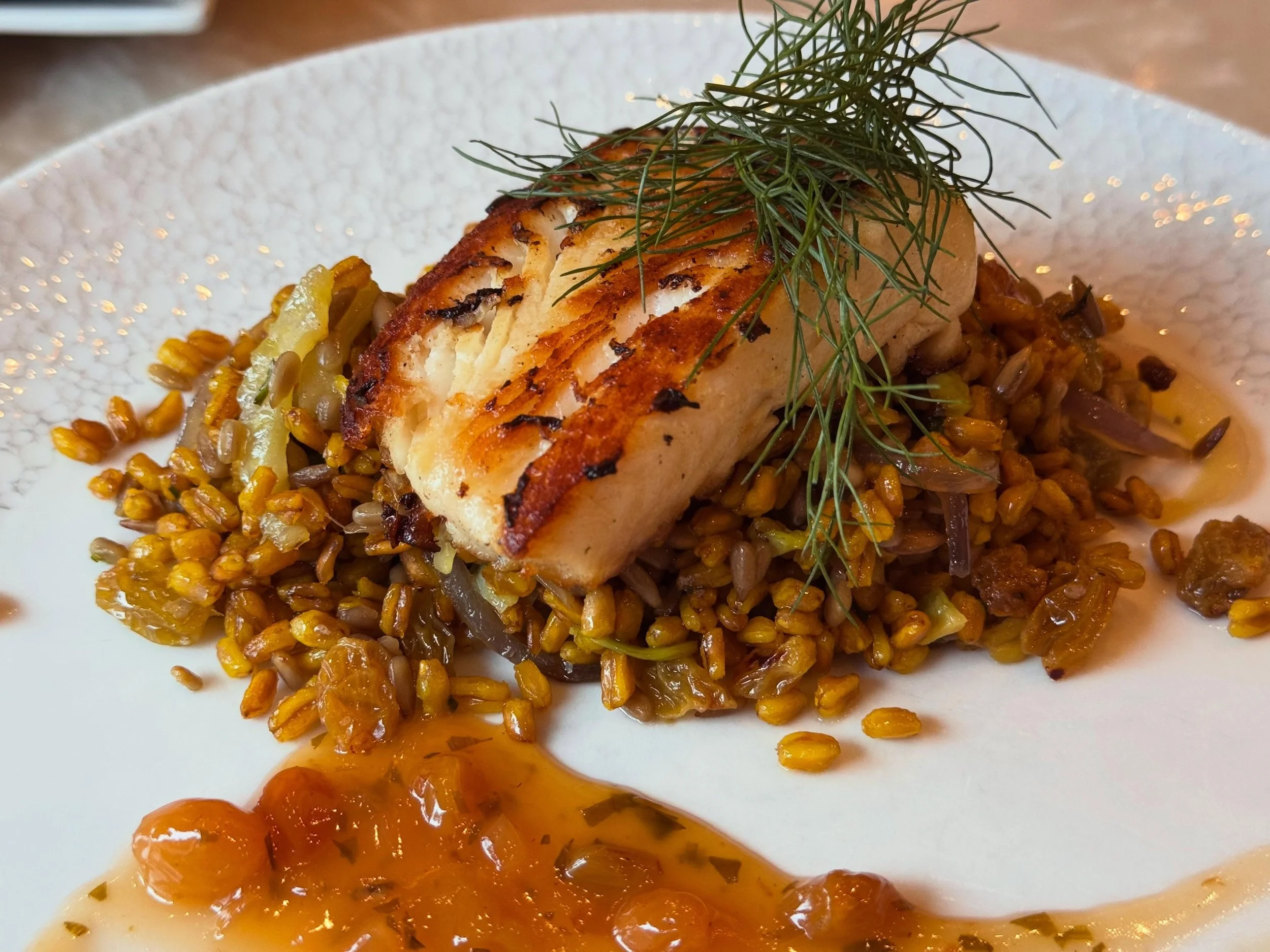 Tonight we&rsquo;re featuring Chilean Seabass over a bed of saffron farro tossed with fennel, red onions, golden raisins &amp; tarragon with a champagne and golden raisin agrodolce. Reservations can be made through OpenTable or calling us at (859) 25