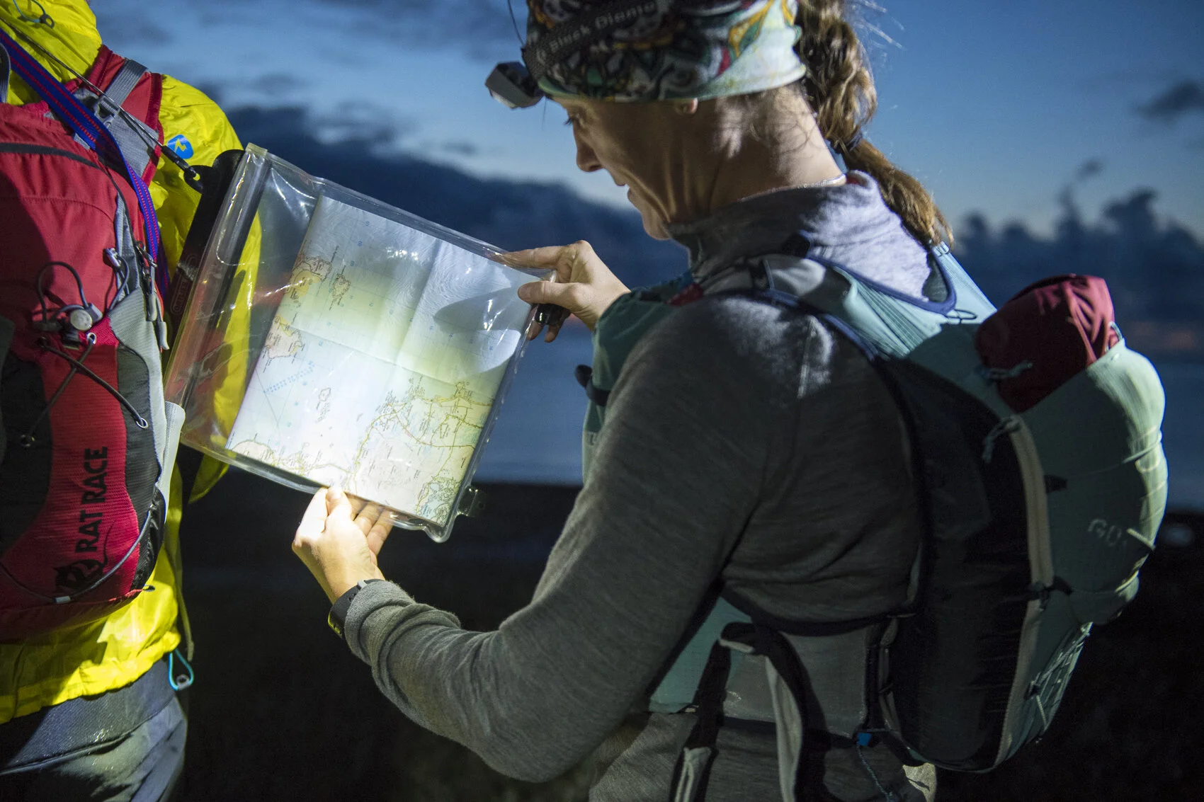 Anna check the map on Day 2. Photo: Leo Francis/Rat Race Adventure Sports
