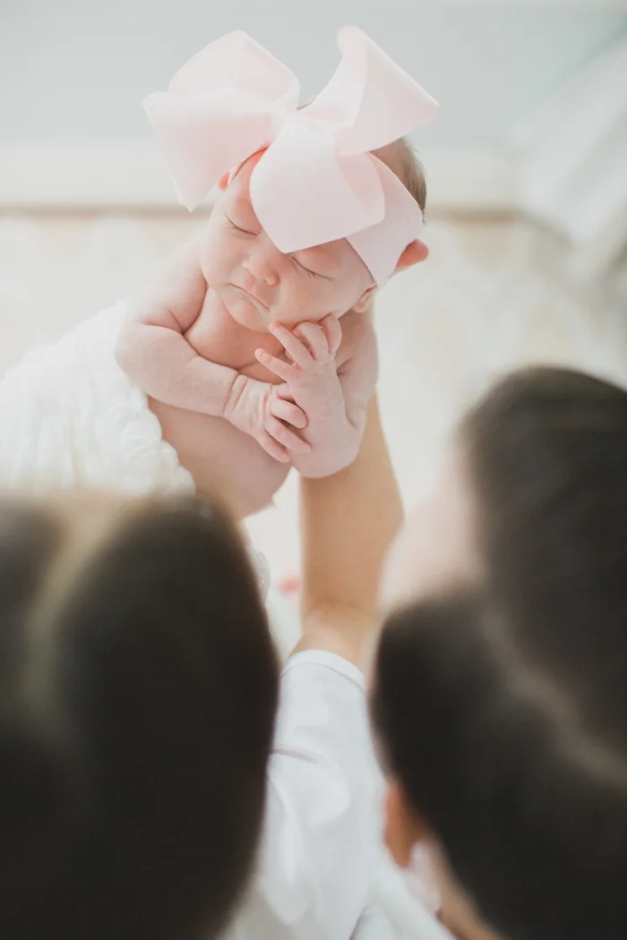 fort worth newborn photographer, dallas newborn photographer, newborn floral photographer, dallas lifestyle photographer, fort worth lifestyle photographer, newborns with bows, allie michie lucas, matthew lucas, lifestyle newborn session, film newborn photographer, film newborn photographer fort worth