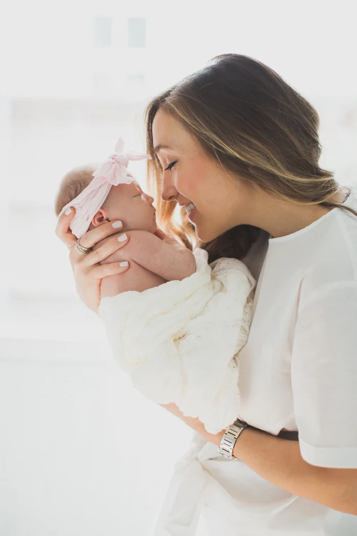 fort worth newborn photographer, dallas newborn photographer, newborn floral photographer, dallas lifestyle photographer, fort worth lifestyle photographer, newborns with bows, allie michie lucas, matthew lucas, lifestyle newborn session, film newborn photographer, film newborn photographer fort worth