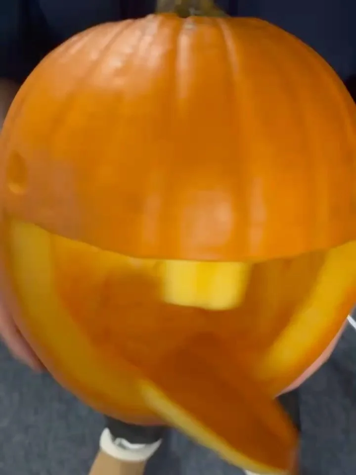 These boys know how to cut pumpkins