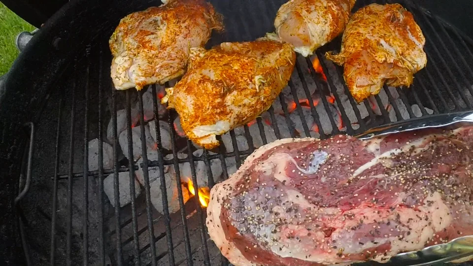 DUCKCHAR Moulard Duck Breast getting placed indirect heat on a two zone charcoal configuration