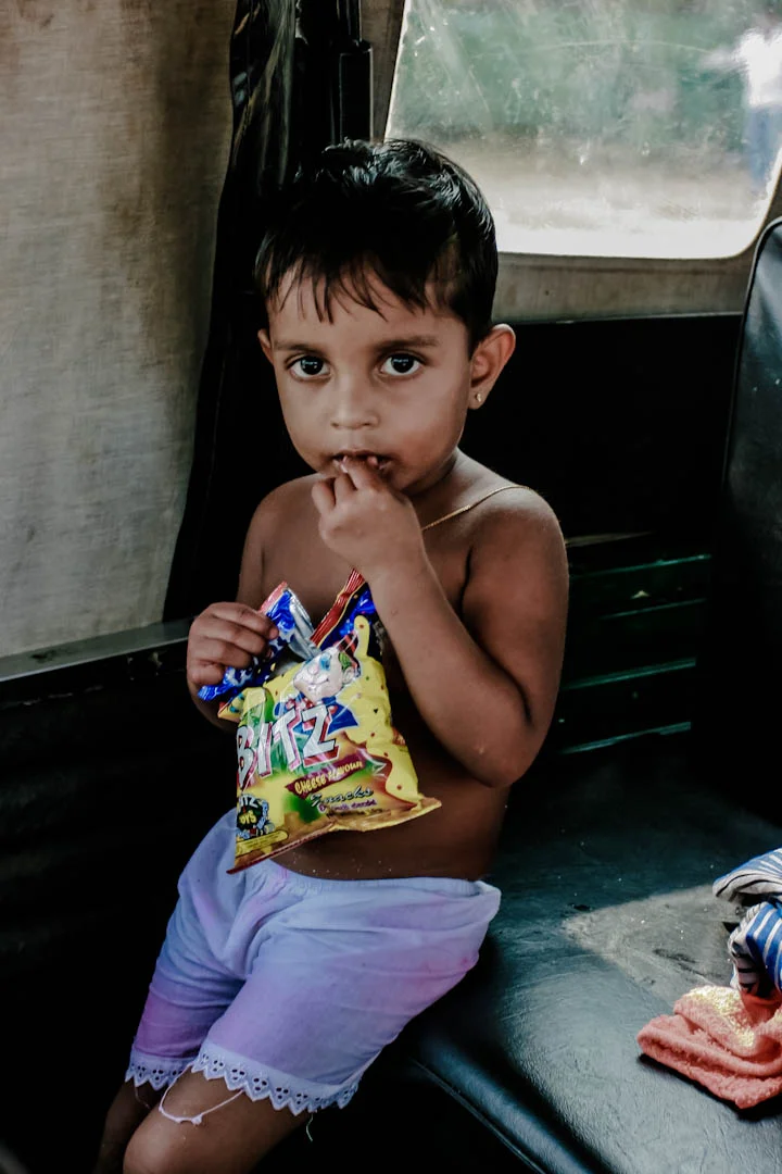 Sri Lanka girl with chips.jpg