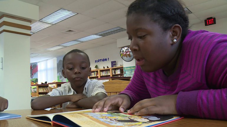 After school reading program binds high school and elementary school students each week