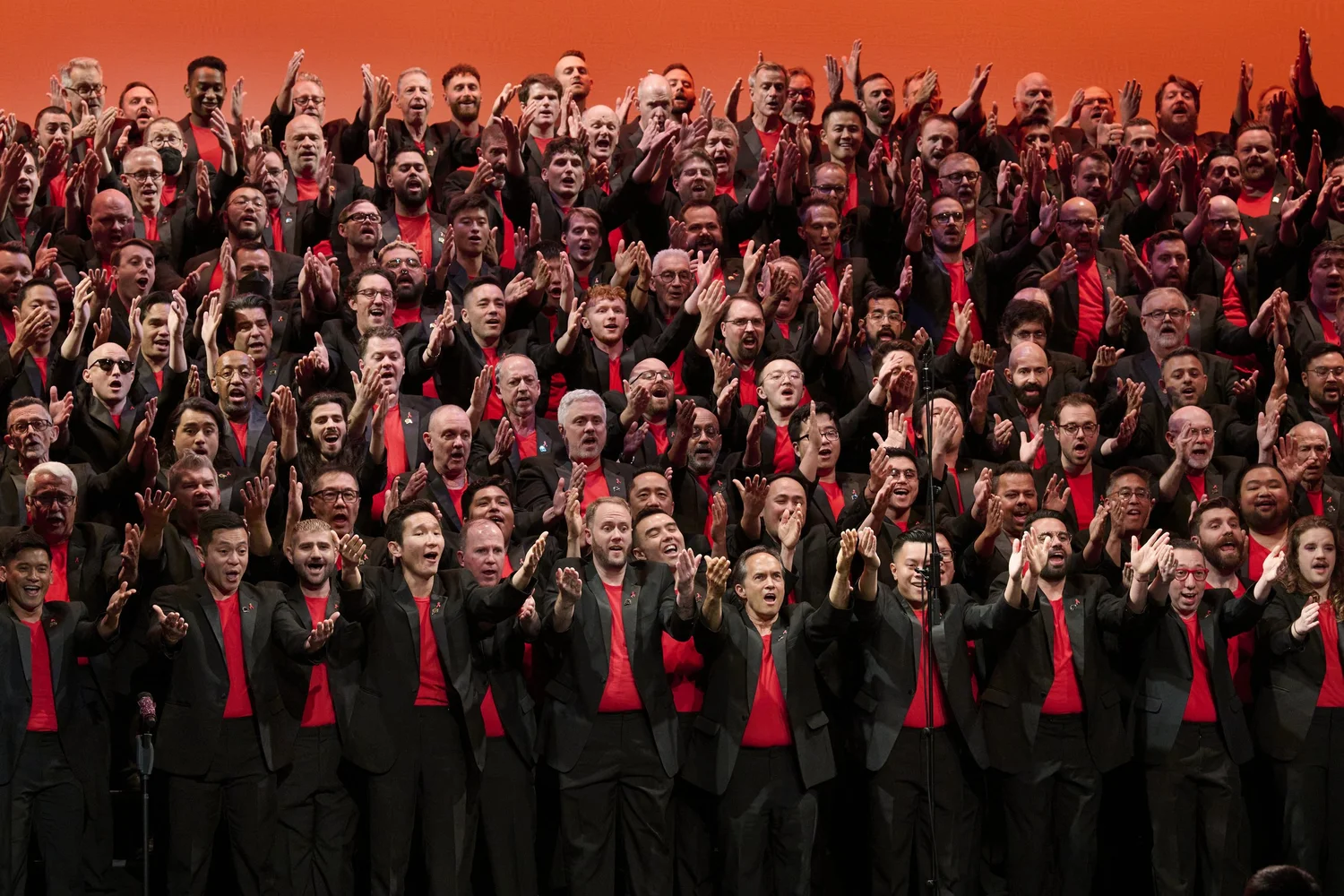 San Francisco Gay Men's Chorus singers performing together.