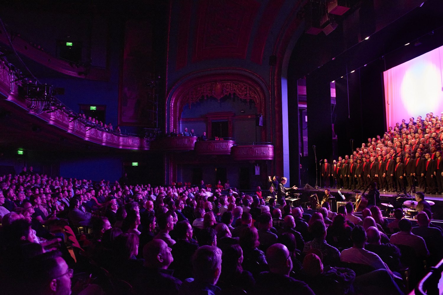 San Francisco Gay Men's Chorus performing on stage.