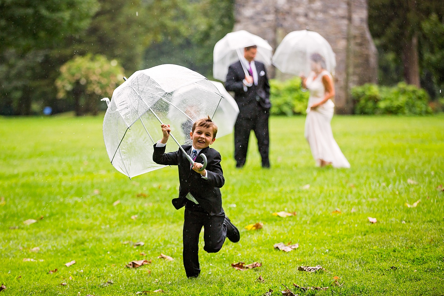 West Chester Pennsylvania Wedding Photographer Family Vow Renewal Anniversary Oakbourne Mansion Park rain umbrella photoshoot