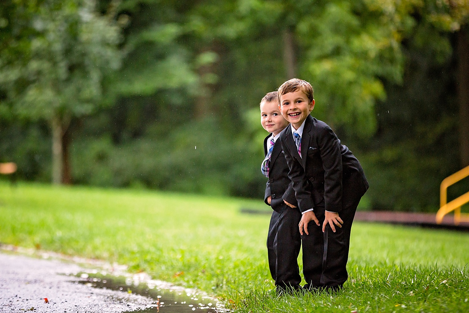 West Chester Pennsylvania Wedding Photographer Family Vow Renewal Anniversary Oakbourne Mansion Park rain mud puddle