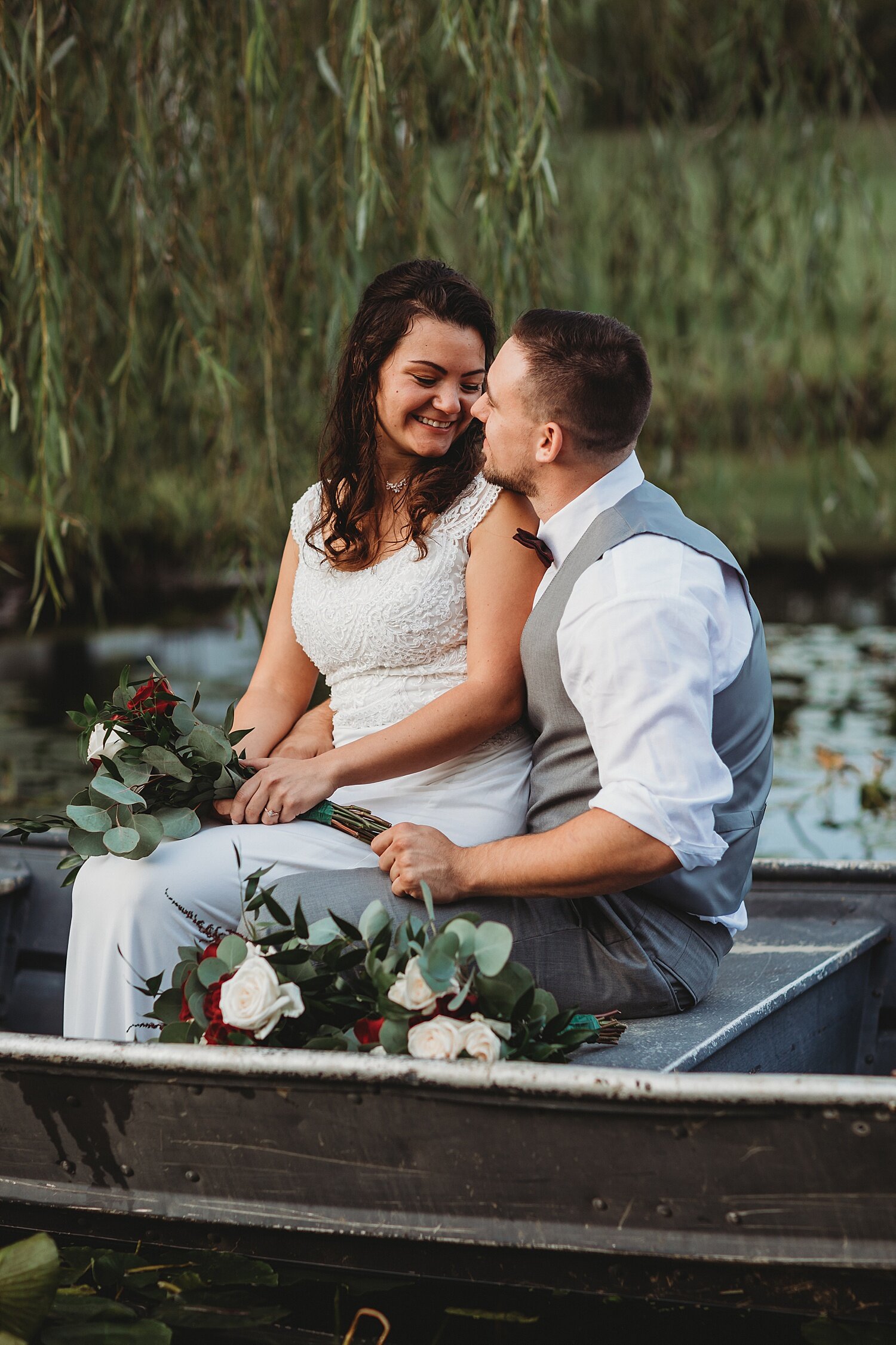Wind in the Willows Grantville Central Pennsylvania Wedding Photographer pond rowboat bride groom