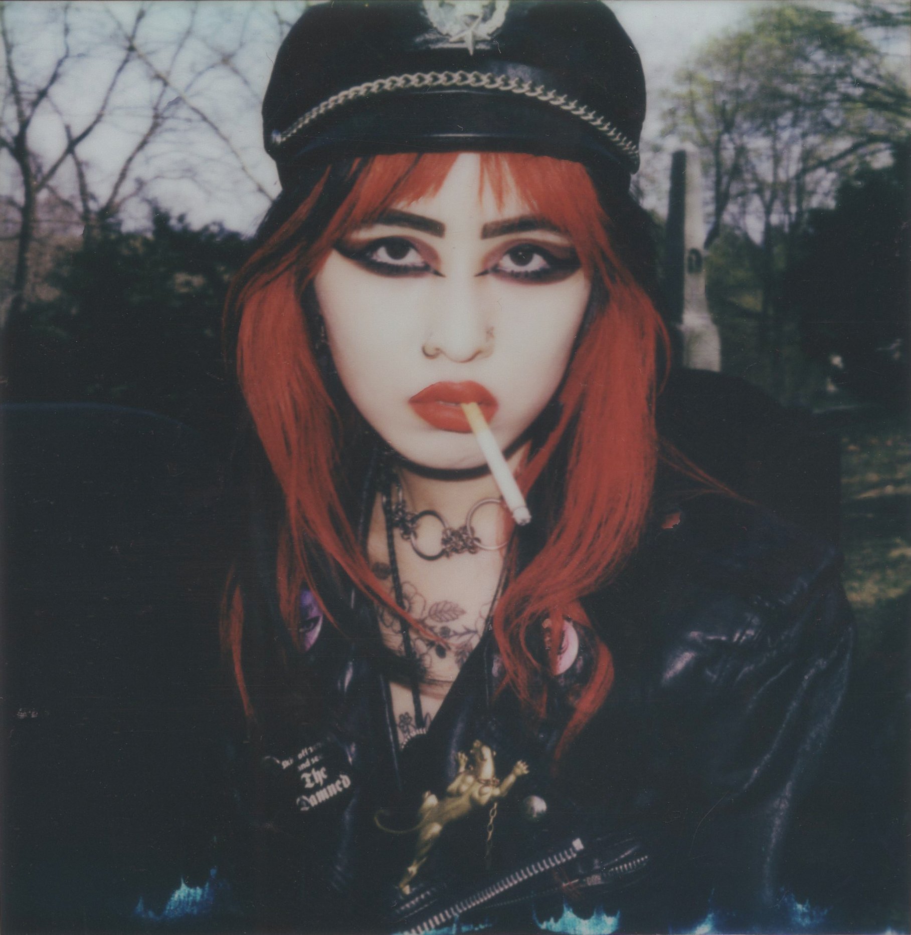   Olivia Smoking,  2023, 4.25" x 3.5”, Polaroid 600 print 