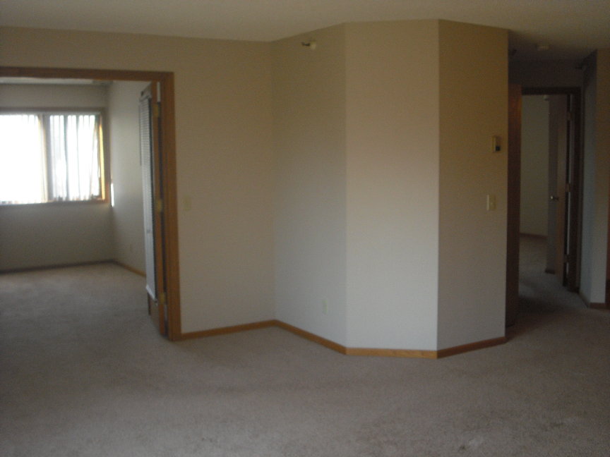 Vacant unit living room and bedroom.JPG