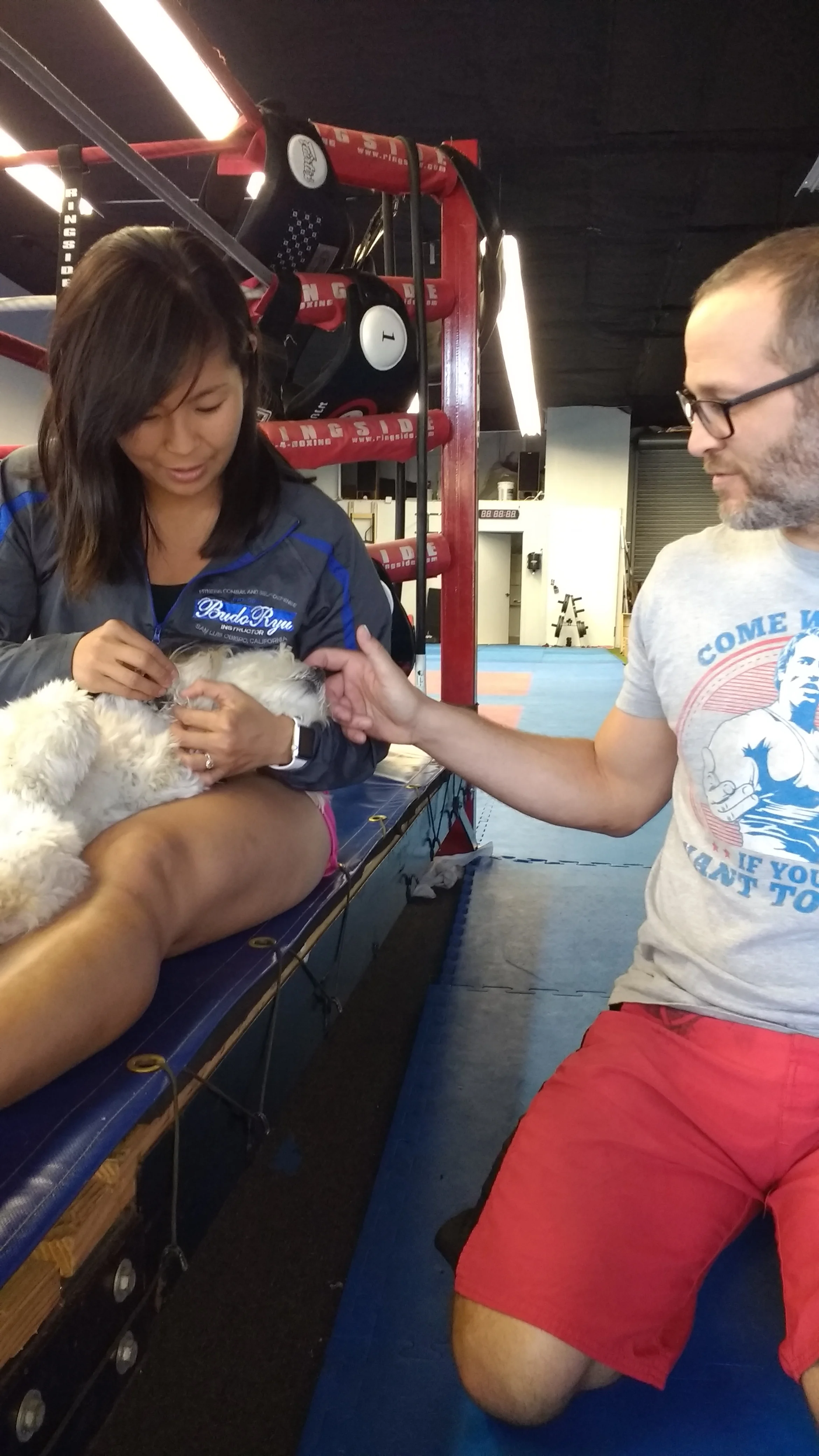 Geri and Eric sandahl with miles the dog at the budo ryu