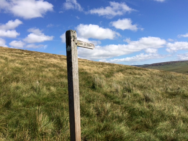 Coast to Coast sign post