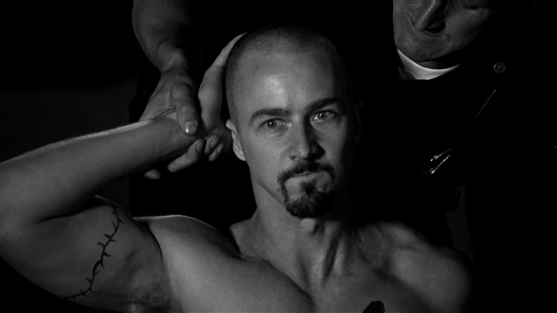 Scene of the movie "American History X". The white supremacist character played by E. Norton is arrested after having killed black thief he found in his house, following him in the street, shooting him, and then, while the thief was not a threat anymore neither for his property or for himself, decided to cruelly end his life. 