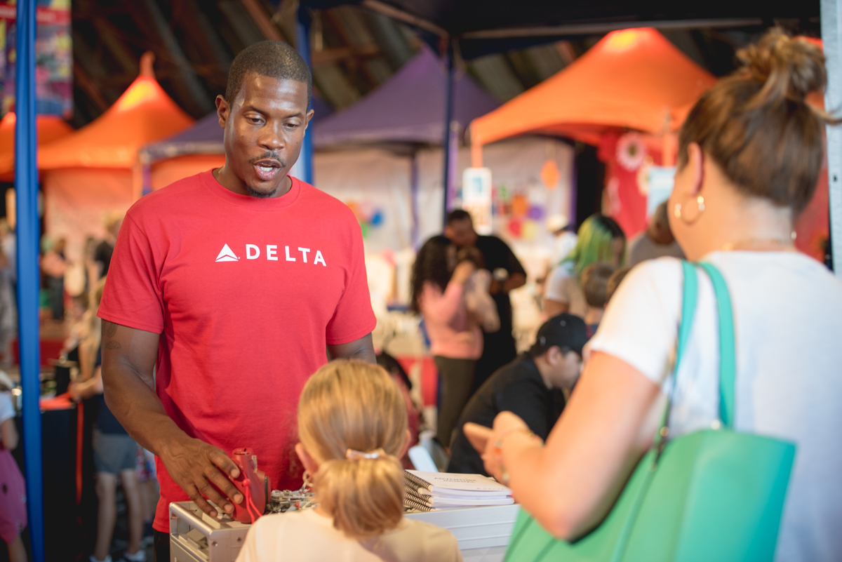 Delta brand ambassador engaging guests at Express Yourself 2017.