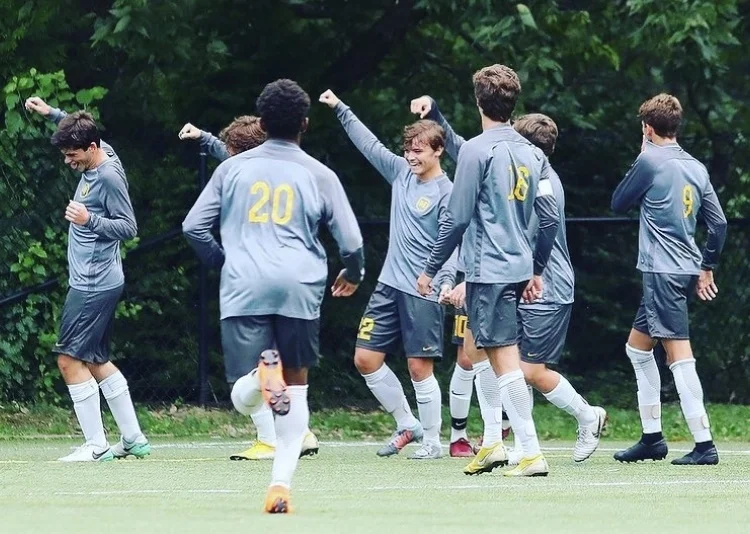 Photo posted to Moeller Soccer’s instagram. The team celebration after a goal.