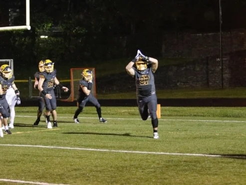 Alex Merritt after a huge safety. Photo by Chris Malone