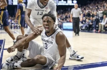 Guard Quentin Goodin flexes to the crowd after drawing a charge. via goodin3, Instagram
