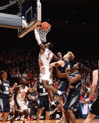 Trey Landers goes up strong for the layup against North Florida. via daytonmbb, Instagram