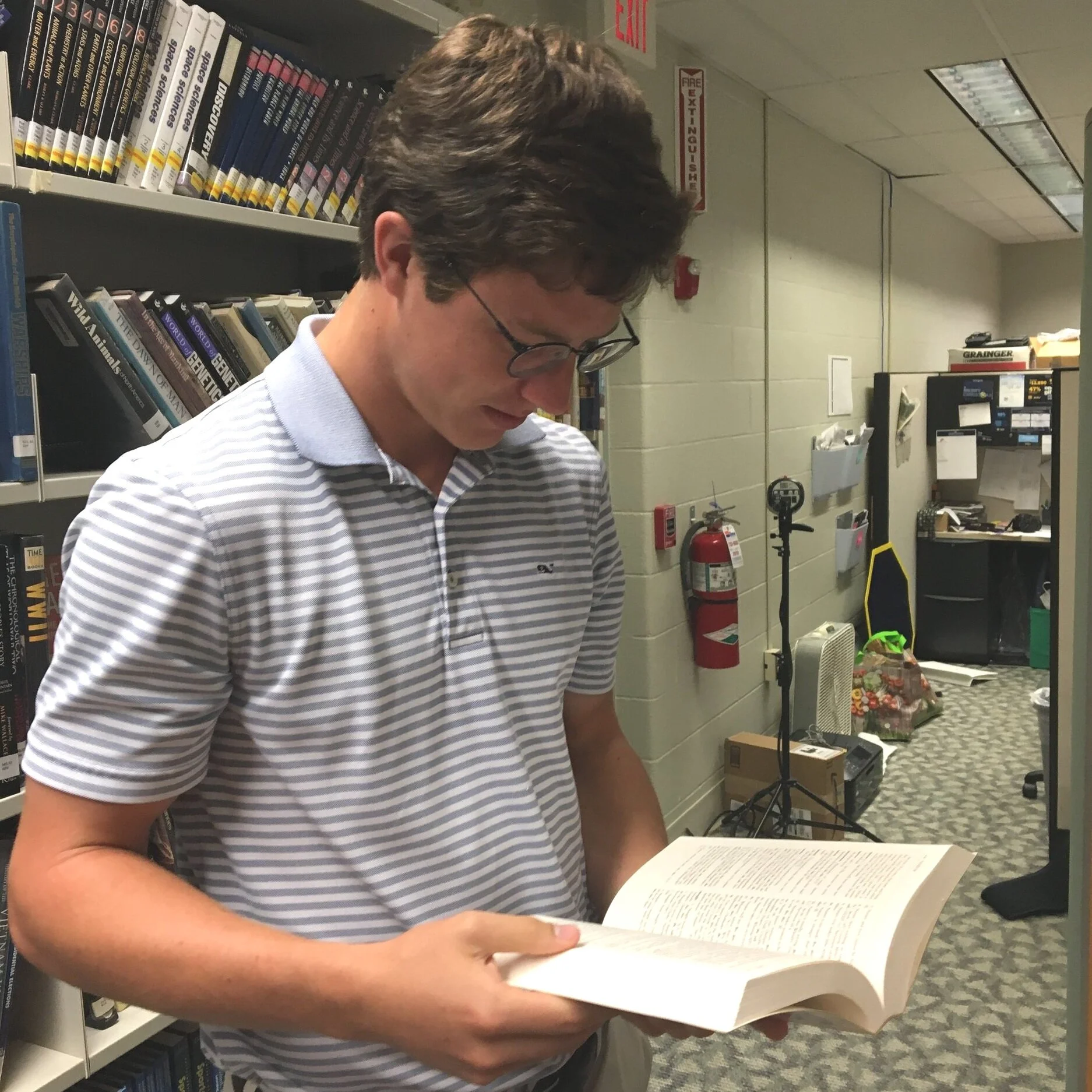 Senior captain Michael Currin deep in his studies by Jack land