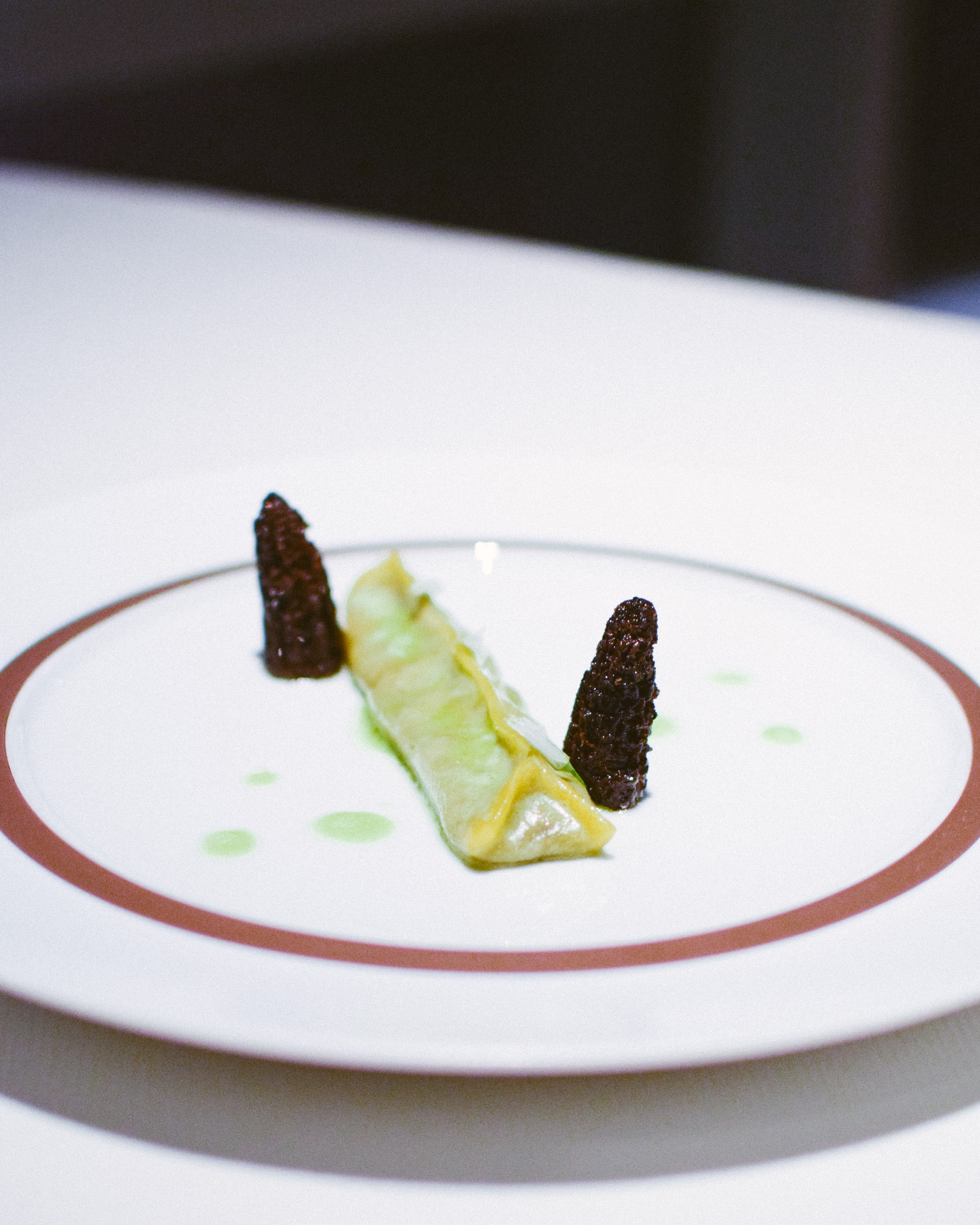Ninth Course: Burgundy Snail, Morel Pasta, Wild Ramp