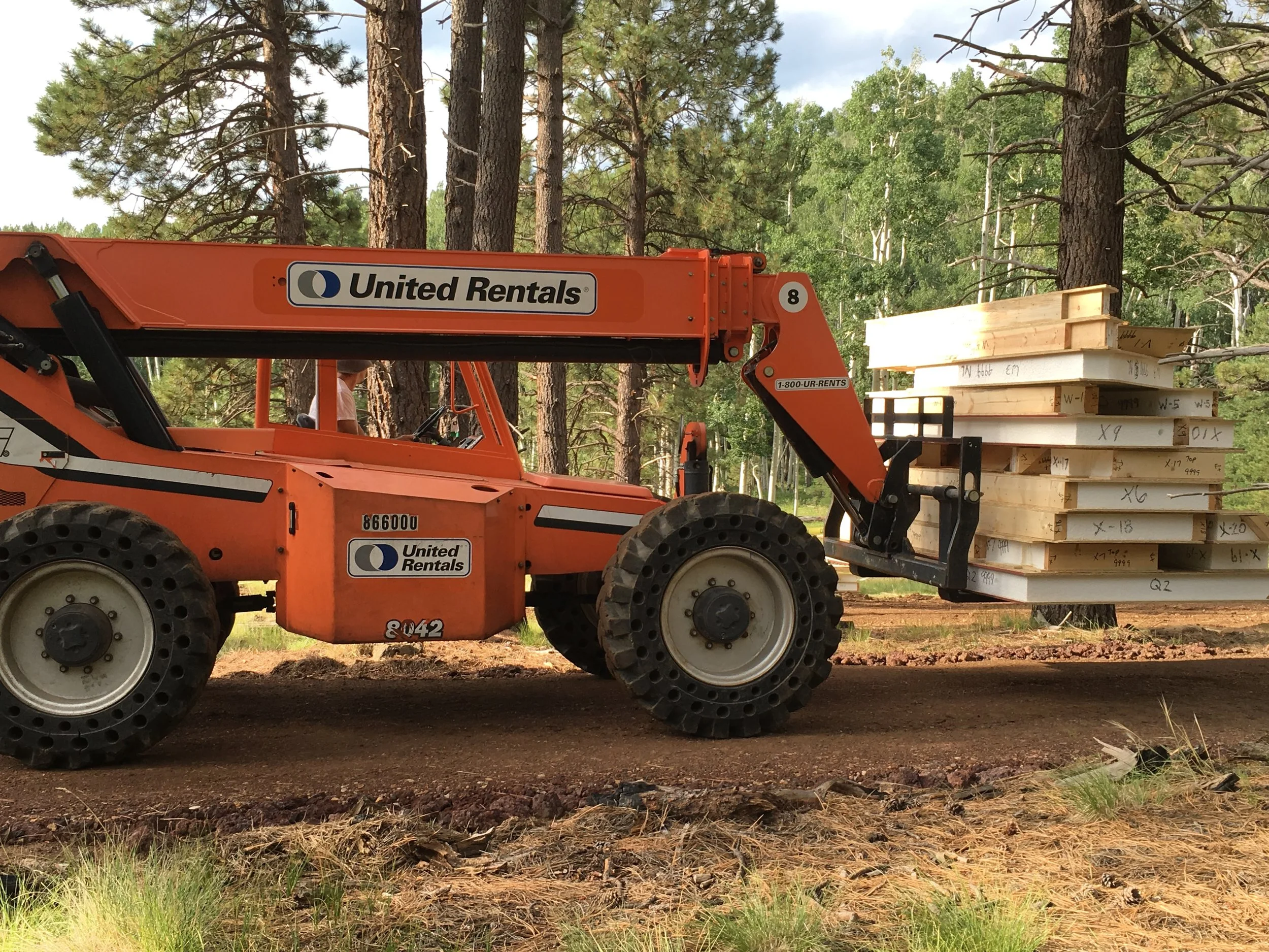 Moving SIPS up to the home site & foundation...