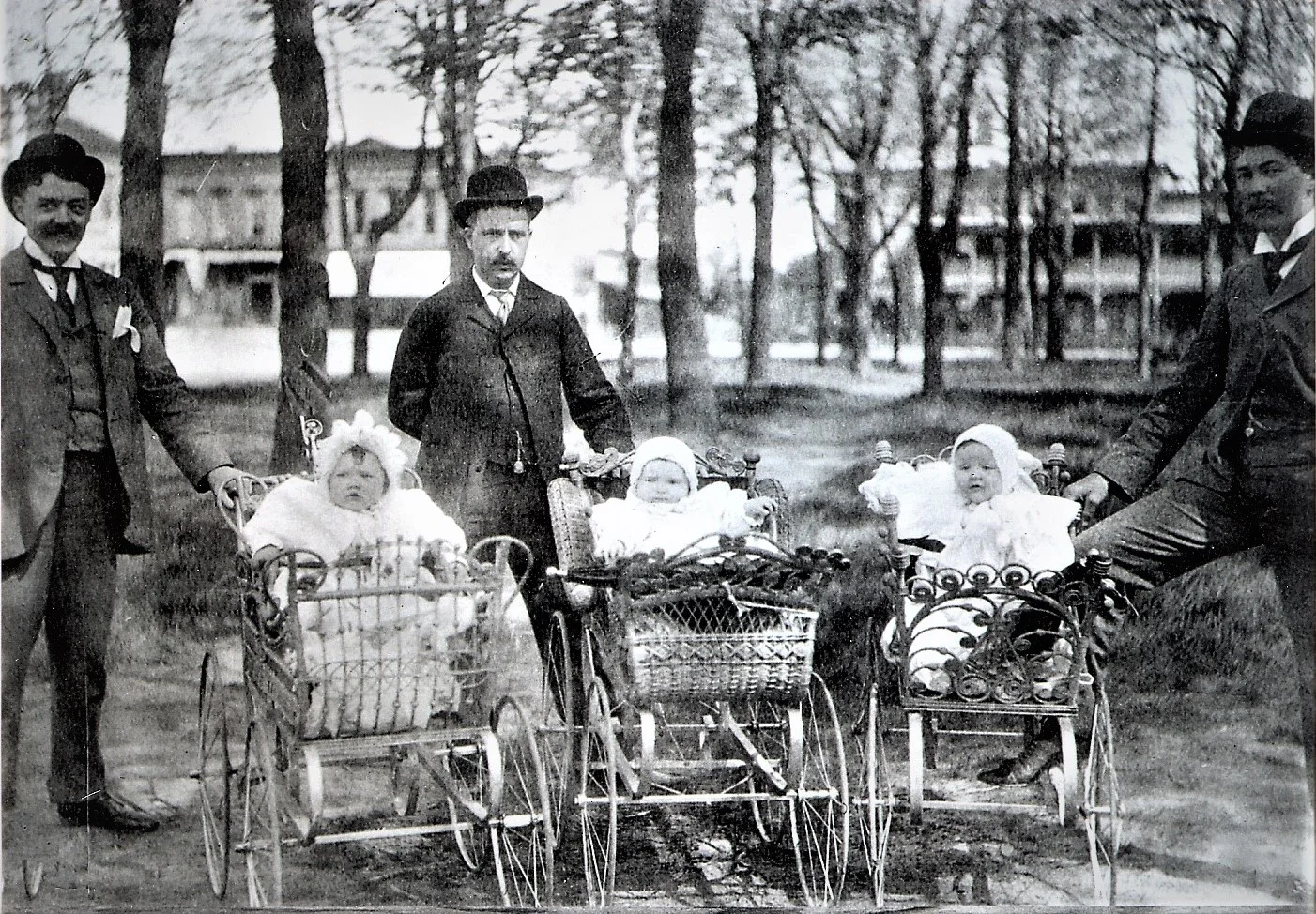 F. E. Edwards, George F. High and Albert Oatman with children in Uptown Park in 1898