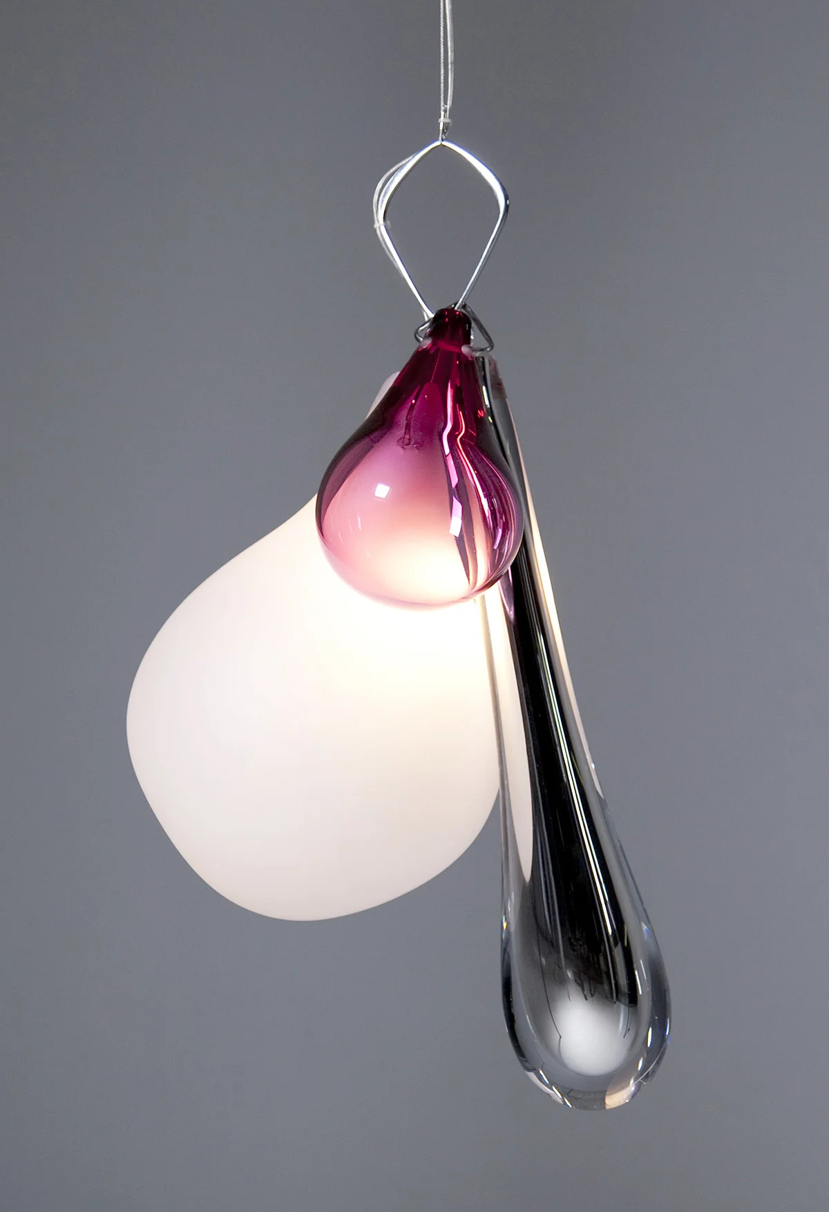 Bonbon jewel lighting, 2009 Pieces for home interiors are chosen as focus pieces and as “jewels” for home. Chandeliers and their crystals are the cherry on top in an interior. Hely and Bonbon are jewels of light. Formed by colored glass balls with colous to enhance the harmony of the shapes. In lightings, the light bounces and replicates it self and the glass pieces creating a light full of atmosphere. For Katriina Nuutinen Studio. Orders by requests .