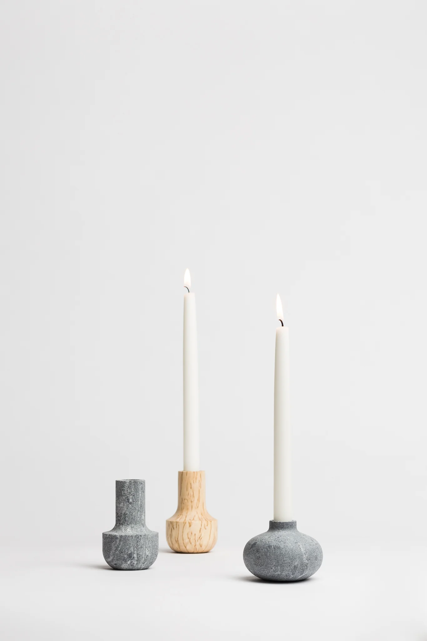 Alku&Aina candleholders, 2017 Alku & Aina candle holders are made from Carelian Soapstone and Finnish Curly birch. Both these materials occur naturally where Katriina’s roots are, in Carelia, Eastern Finland. The round Alku (meaning “beginning”) is the base and the beginning of the tale. It reflects how and where the story begins. The taller one, Aina (meaning “always”) reminds that wherever you are, your roots follow and support you and can be the rock to lean on. Always let the flame shine bright! For Katriina Nuutinen Studio. Buy here.