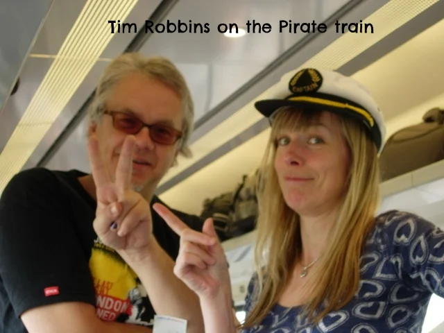 Rogues Tim and Kate on train.jpg
